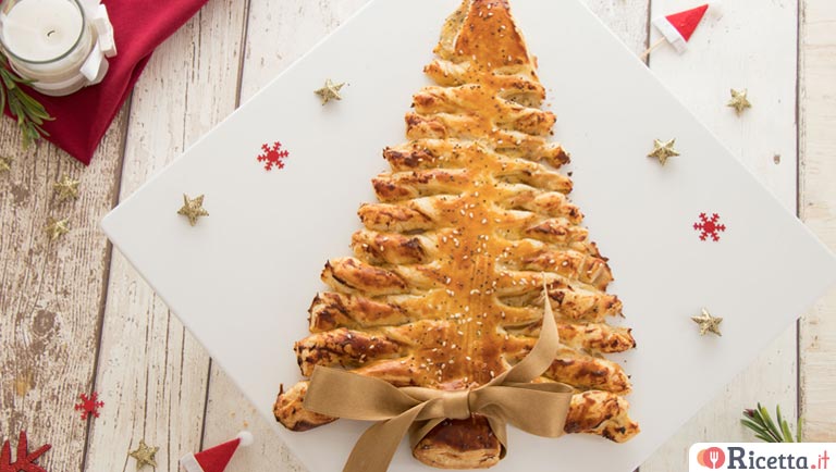 Torta Salata Stella Di Natale.Ricetta Albero Di Natale Di Pasta Sfoglia Consigli E Ingredienti Ricetta It