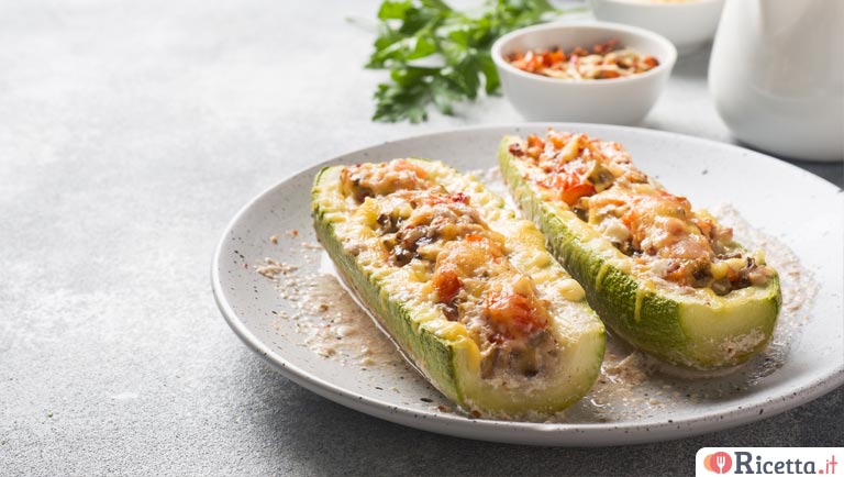 Ricetta Zucchine ripiene di carne e salsiccia - Ricetta.it